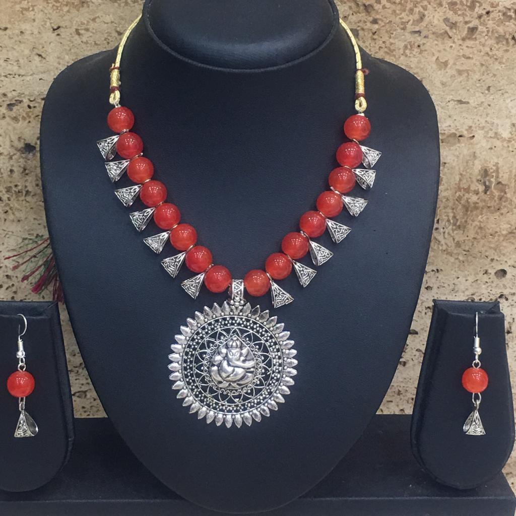 image for Silver Plated Ganesh Ji Pendent Orange Beaded Necklace Earring Set