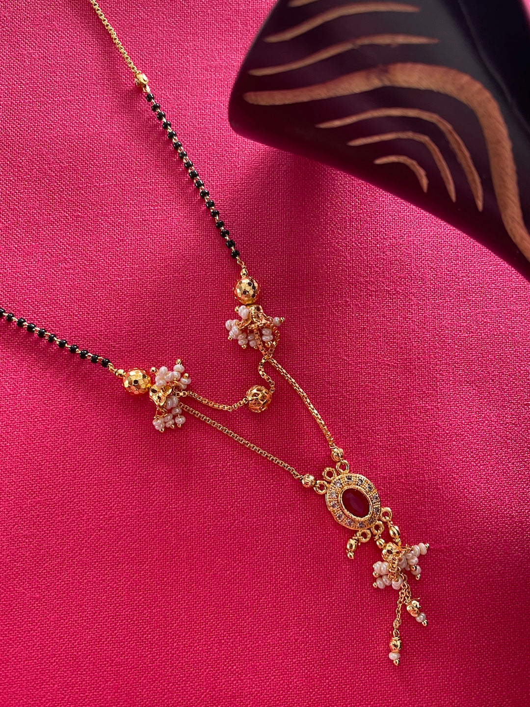 image for Short Mangalsutra Designs simple gold mangalsutra Red Stone double line black beads chain
