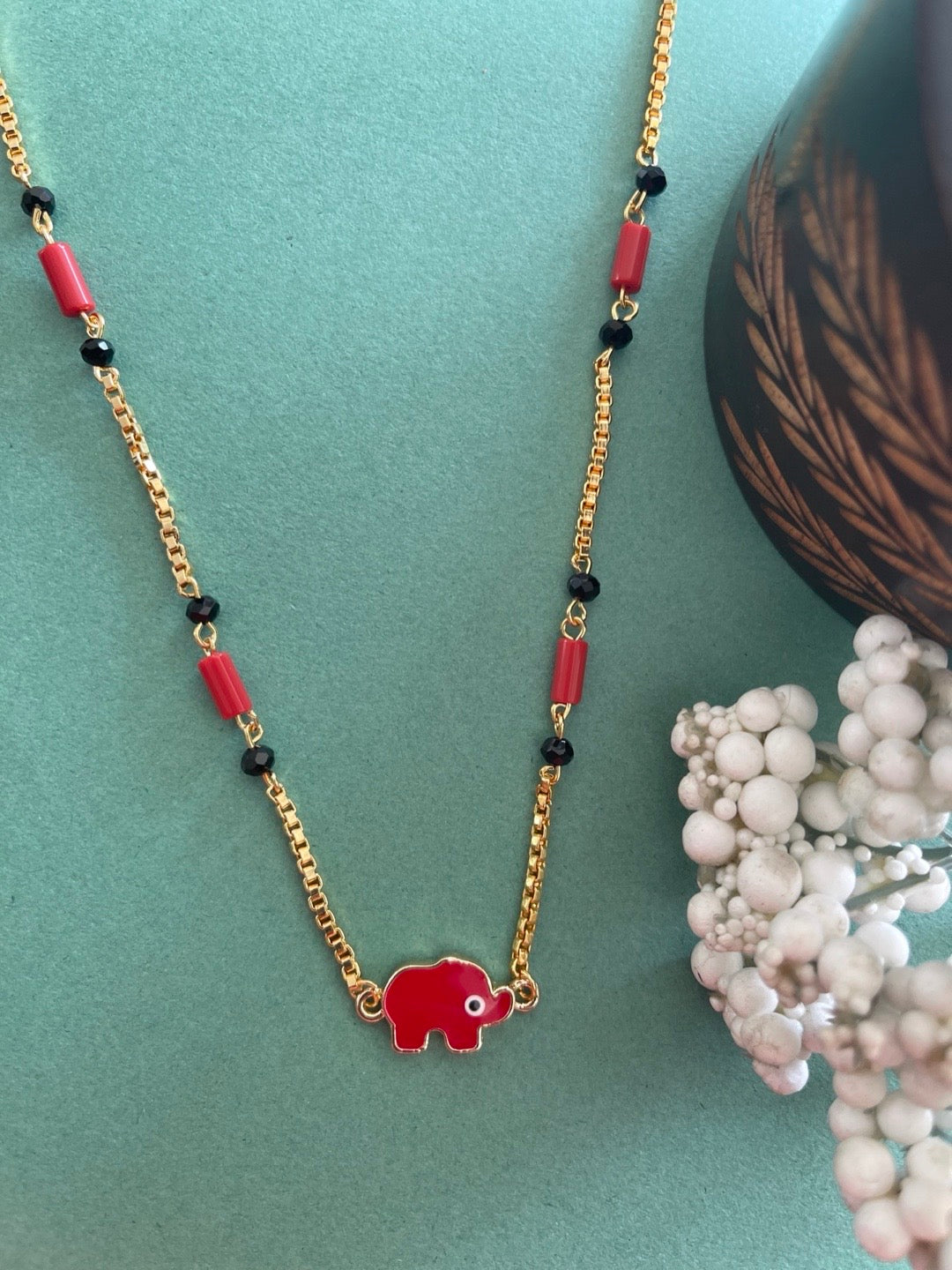 image for Simple Trendy Short Mangalsutra Designs Elephant Evil Eye Pendant Red & Black Beads Gold Chain