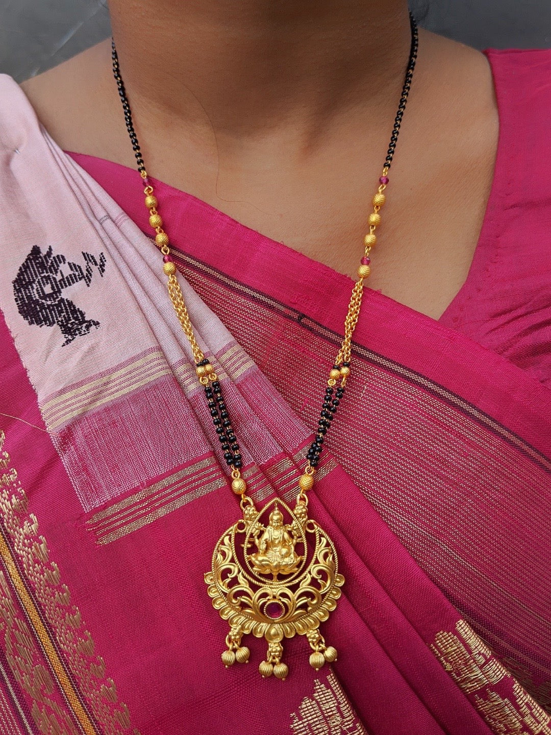 image for Short Mangalsutra Designs gold mangalsutra Hindu god Lakshmi (Laxmi) pendant black gold beads chain