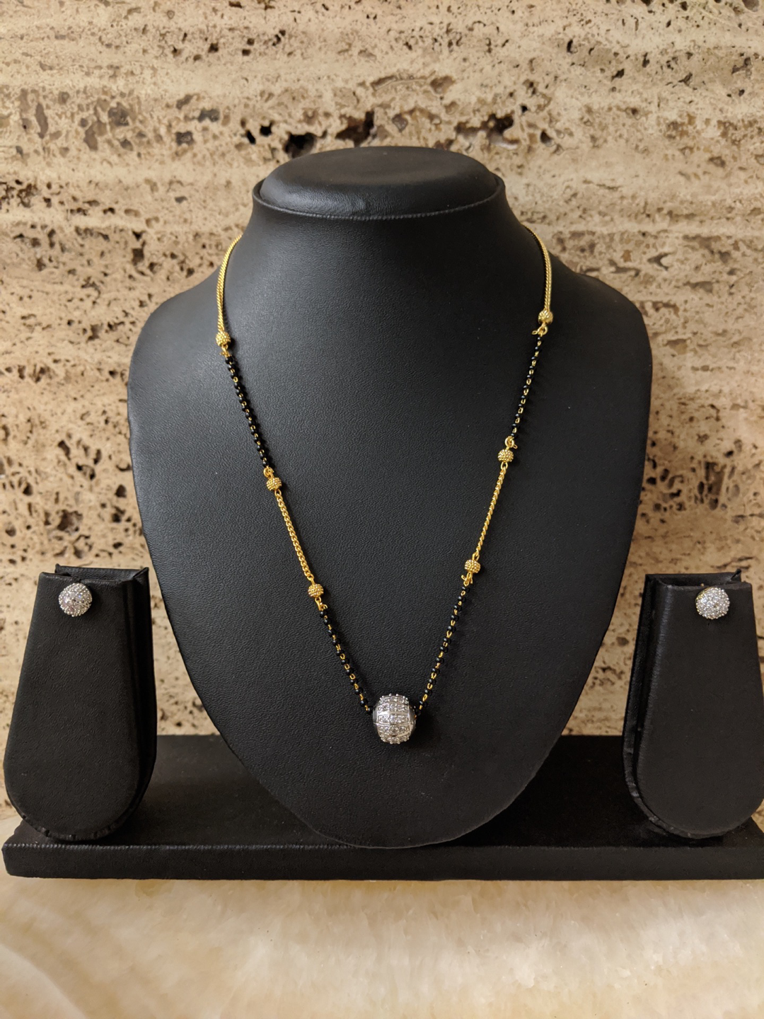 image for Fancy Short Mangalsutra Designs American Diamond Ball Pendant Simple Black Beads Gold Chain