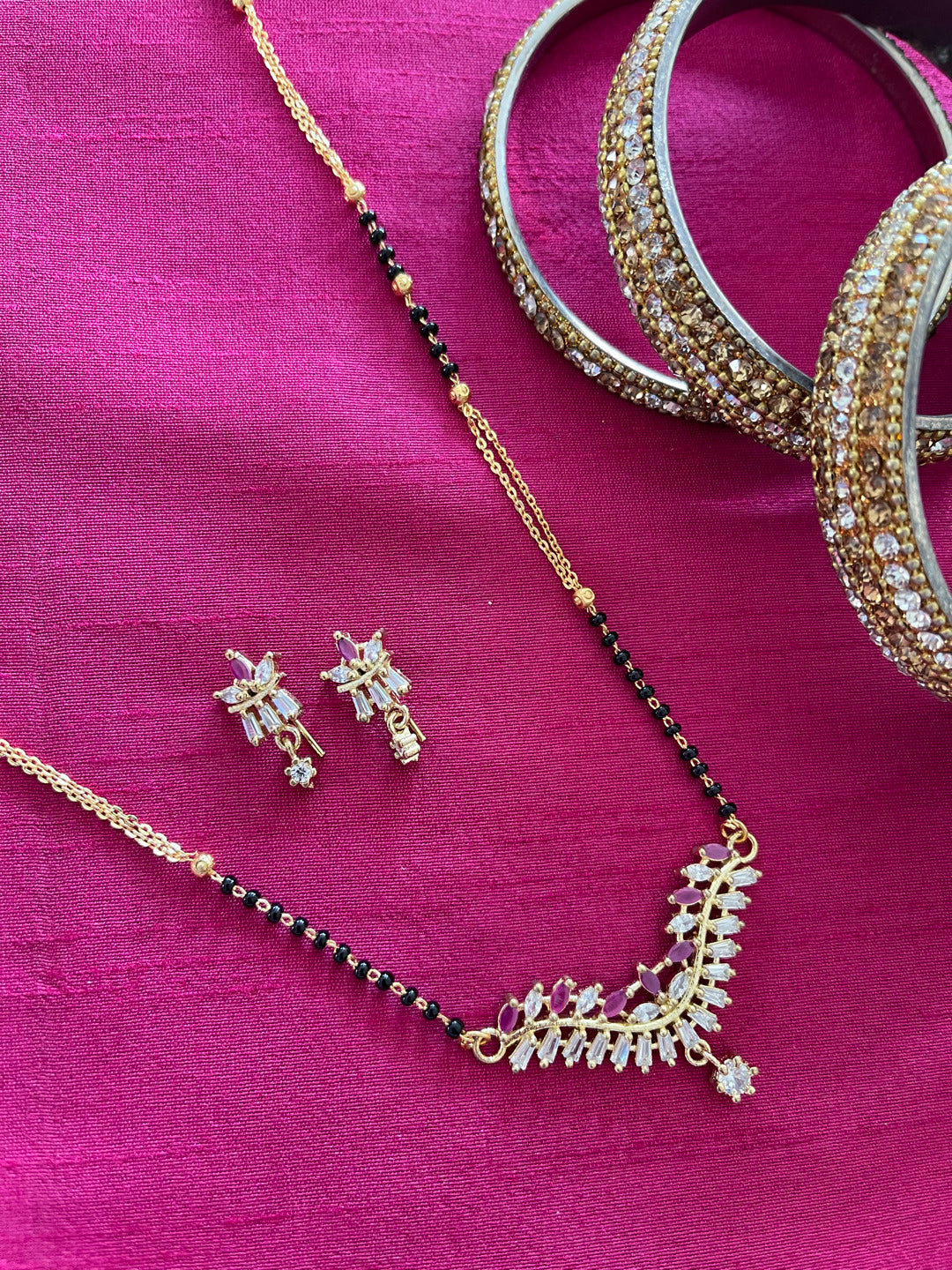 image for Short Mangalsutra designs set with diamond earrings simple gold mangalsutra black beads chain