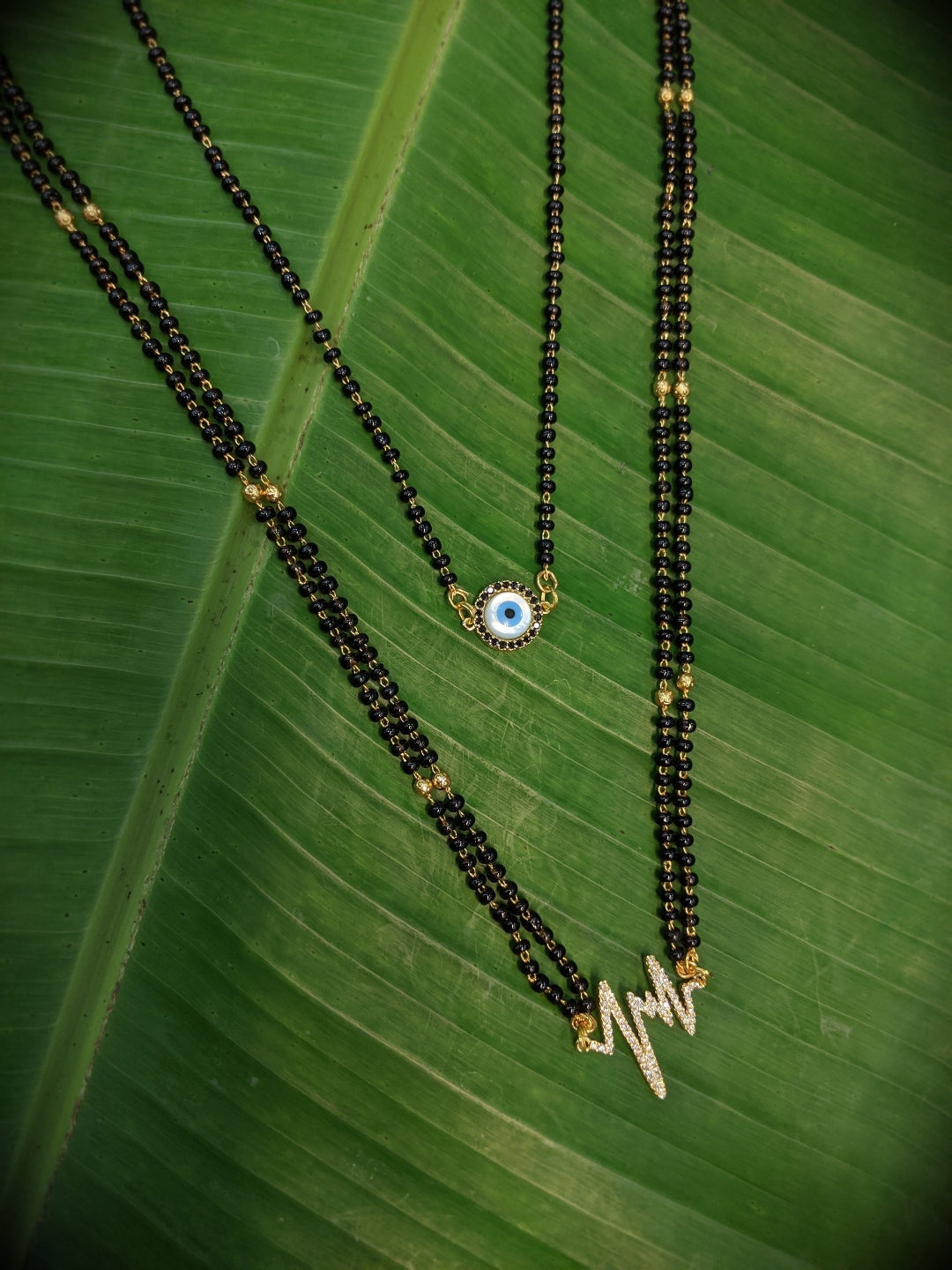 image for Combo Set of 2 Mangalsutra Designs Gold Plated Evil Eye & Heart Beat Designs CZ Pendant Mangalsurtra