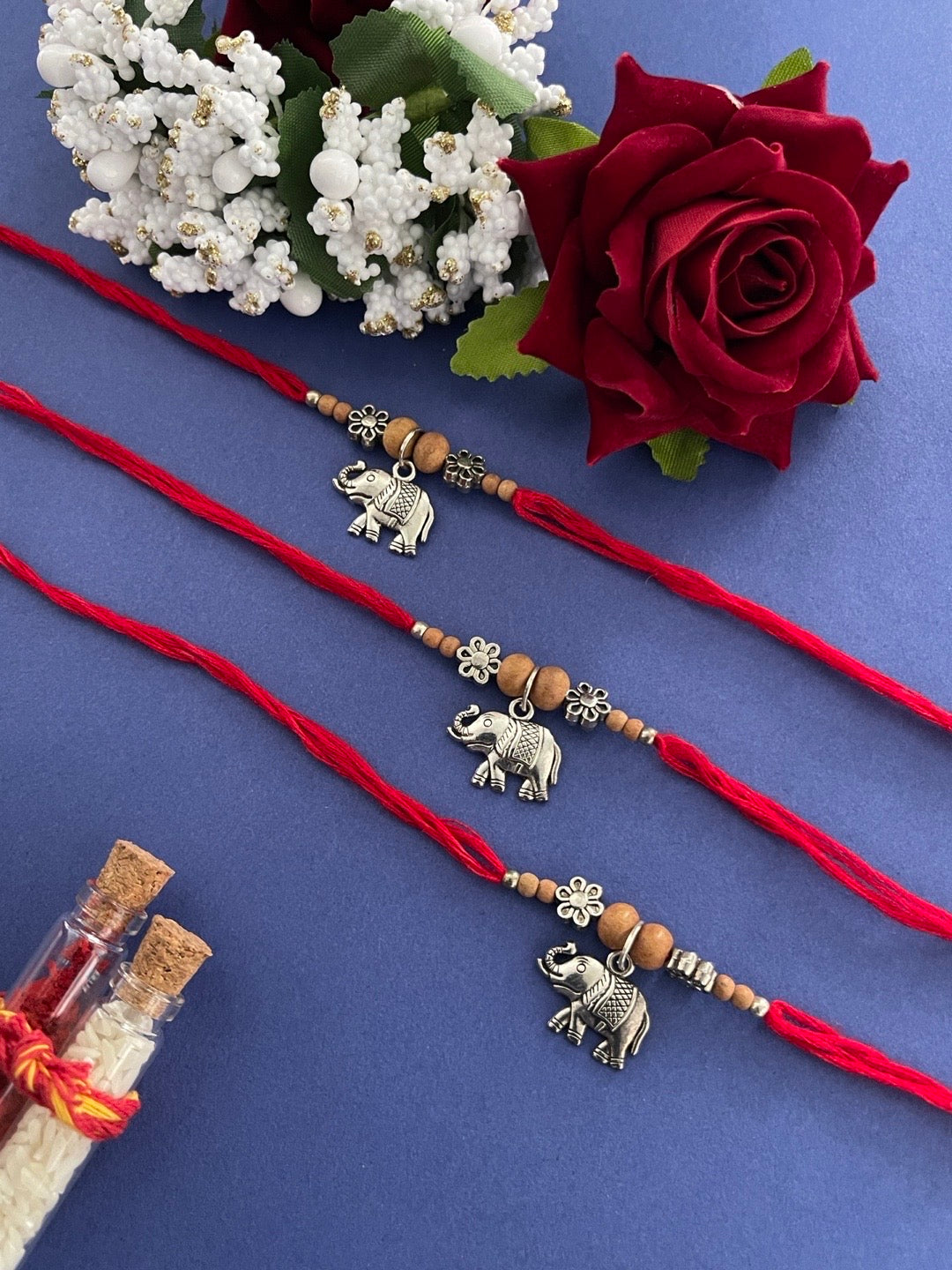 image for (Set of 3) Elephant Designer Rakhi with Silver Plated Charms Floral Bead Red Thread Rakhi for Brother