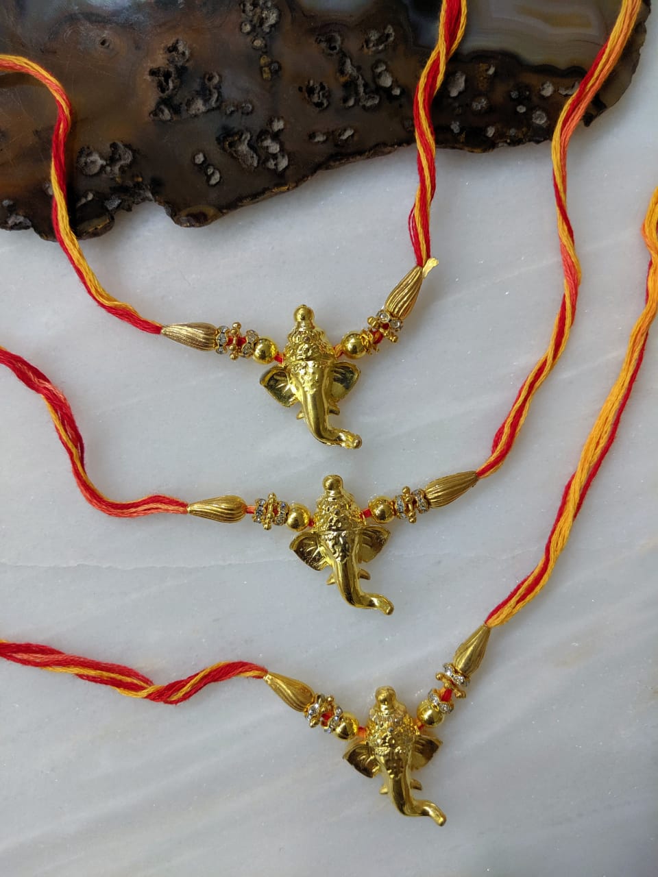 image for (Set of 3) Designer Rakhi with Gold Plated Ganpati Bappa Bead Multicolor Thread Rakhi for Brother