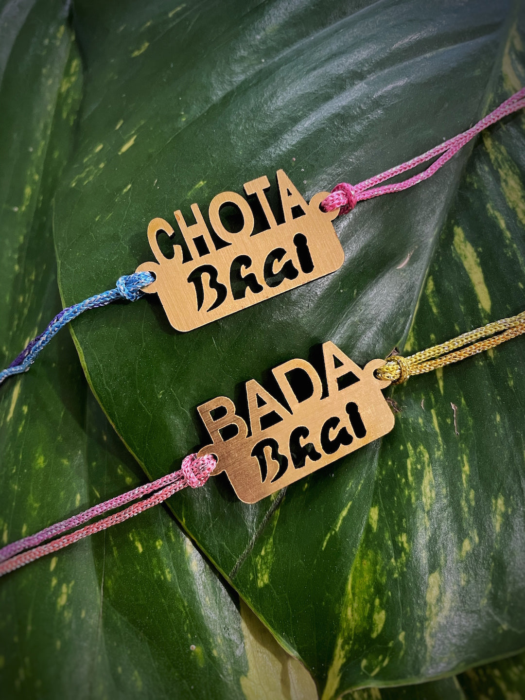 image for (COMBO of 2) Fancy Rakhi Designs with Slogan Chota Bhai/Bada Bhai Multicoloured Mauli Raksha Bandhan