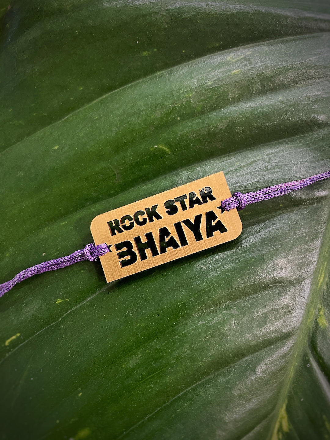 image for Unique Personalized Rockstar Bhaiya Wooden MDF With Multicolored Thread Rakhi For Raksha Bandhan