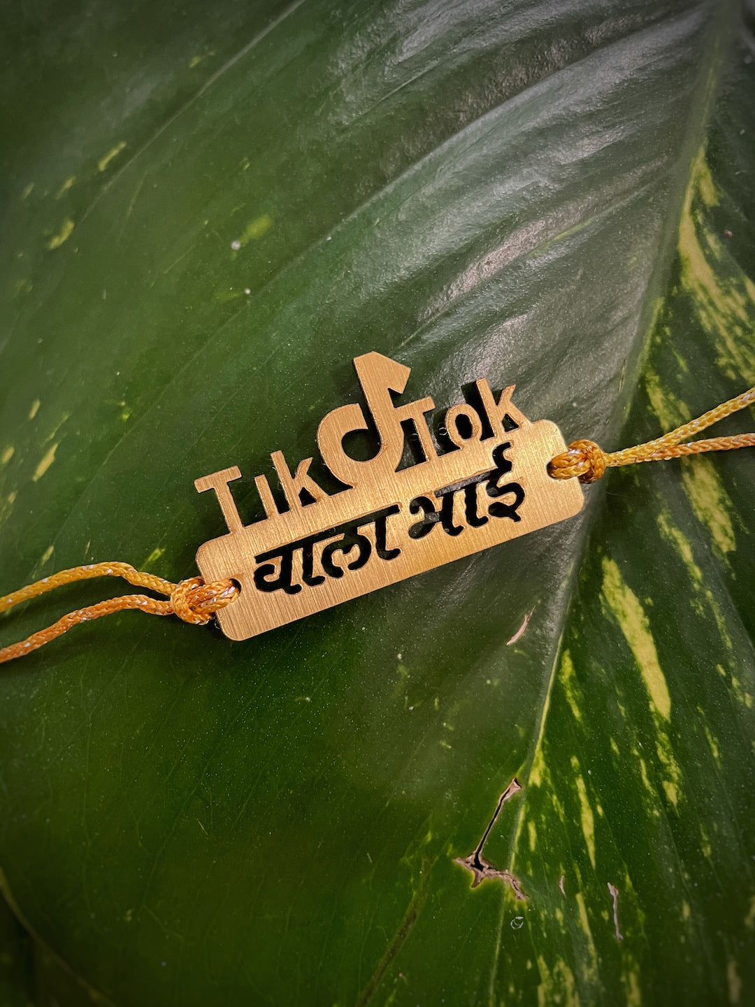 image for Fancy Rakhi Design with Funky Social Media Slogan TIK TOk Wala Bhai Pendant Mauli Raksha Bandhan