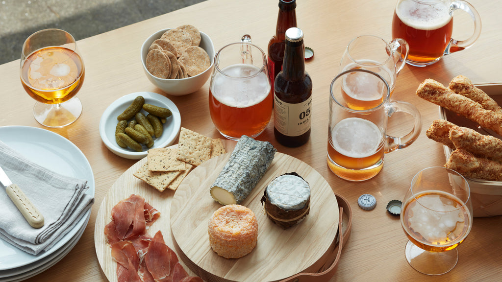 luxury glassware on display with meats and cheeses