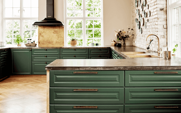 furnipart gold manor handles and knobs on green shaker kitchen fronts