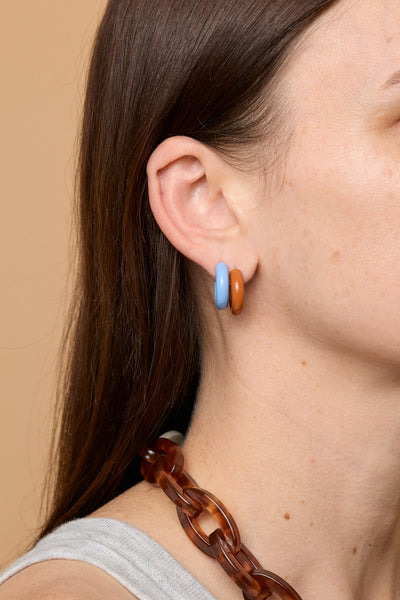 Enamel coloured hoop earrings layered in ear Bianca Mavrick