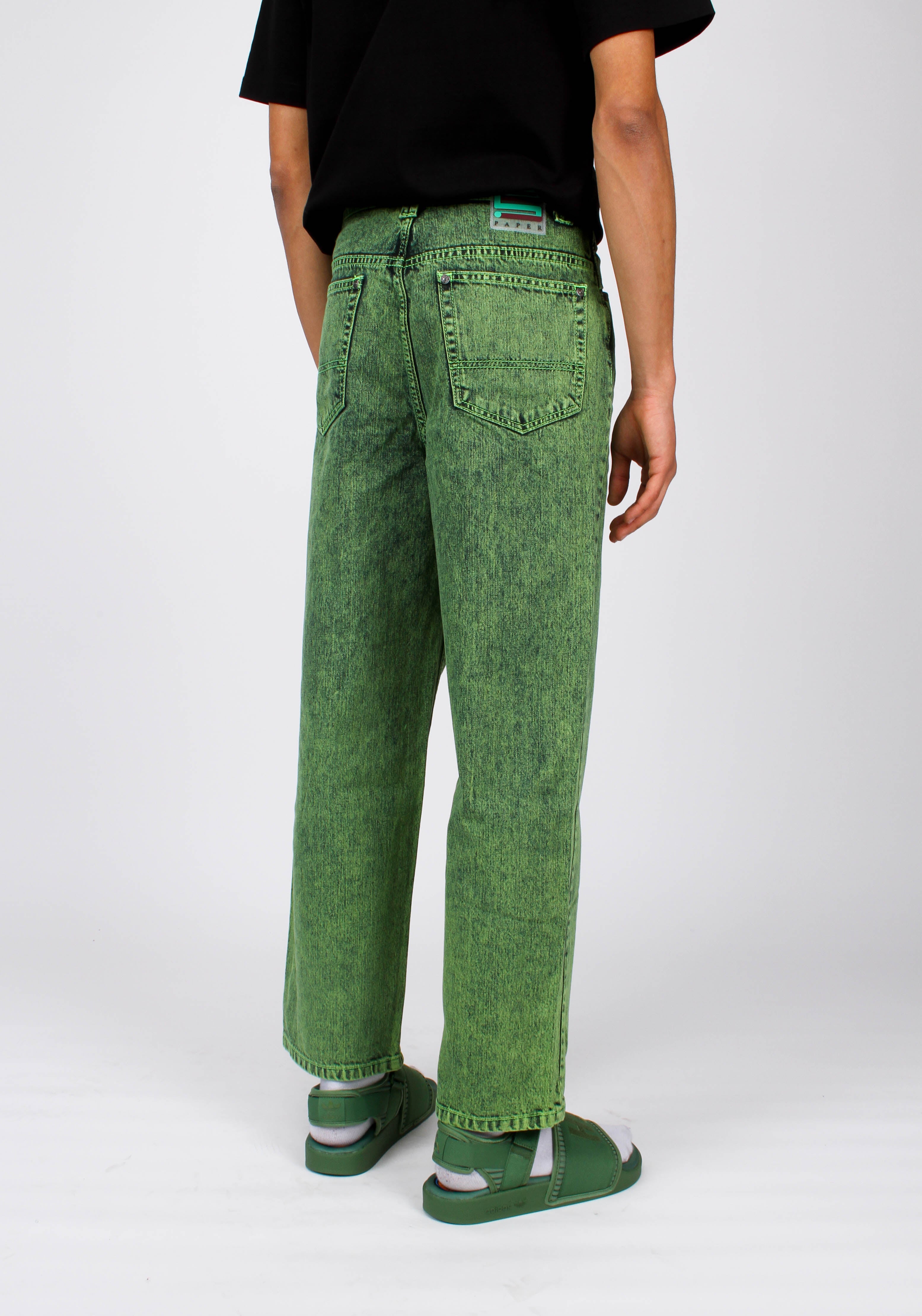 green denim pants