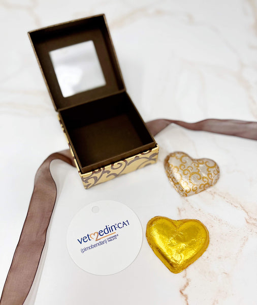 Luxury gold gift box with chocolates