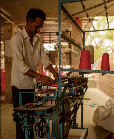 Machine for threading bobbins in Sanchor, Rajasthan