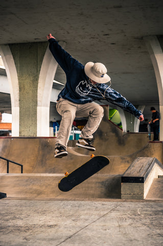 Kid Performing Cool Skateboard Trick