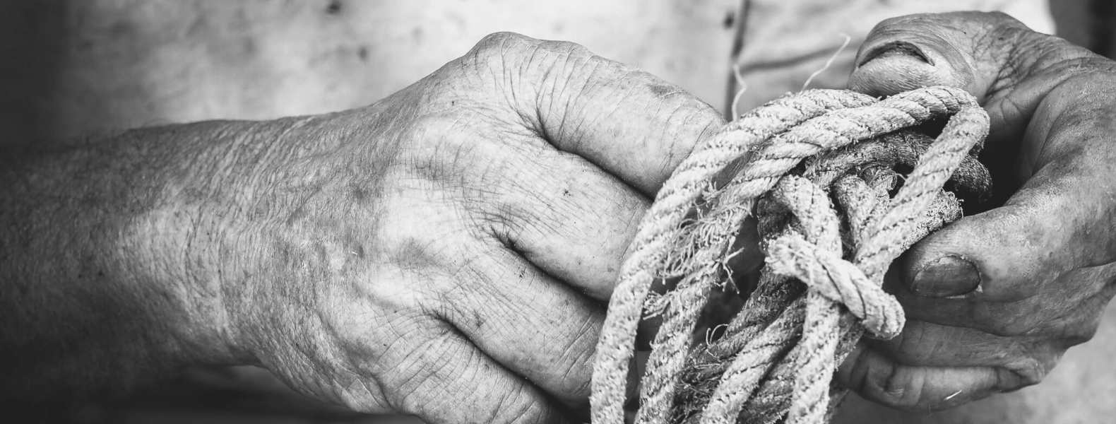 old hands and rope