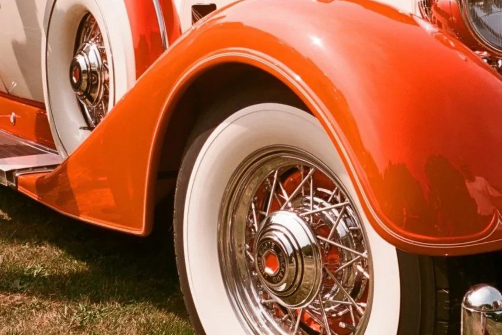Kodak Film Shortage- what to shoot| Close up of red vintage car wheel