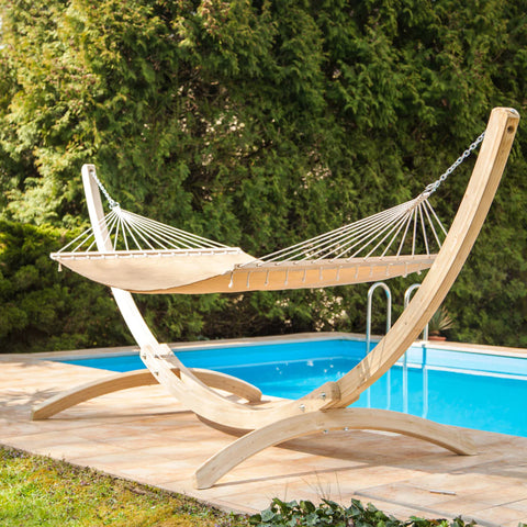 white hammock on stand by pool