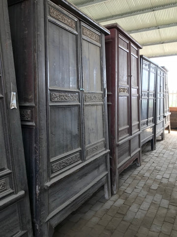 Antique armoires awaiting restoration