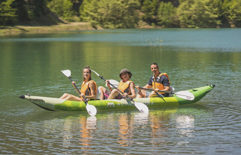 picture of a family riding a tandem kayak