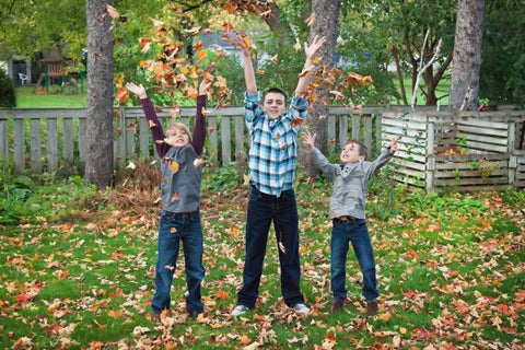 Throwing Leaves in Fall