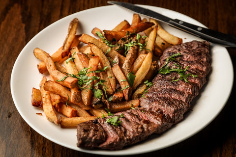 Dinner plate with steak and fries