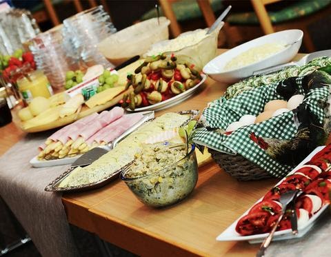 Table filled with potluck food