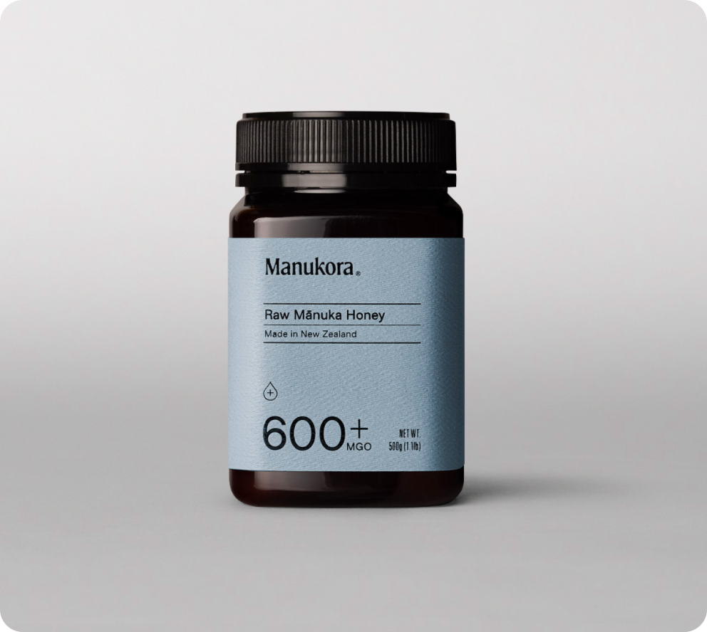 Jar of Manukora Raw Mānuka Honey, 600+ MGO, Made in New Zealand.