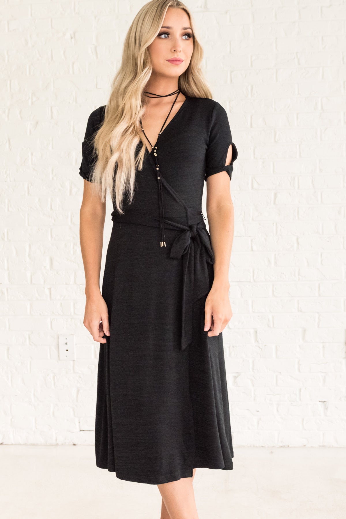 black flowy wrap dress