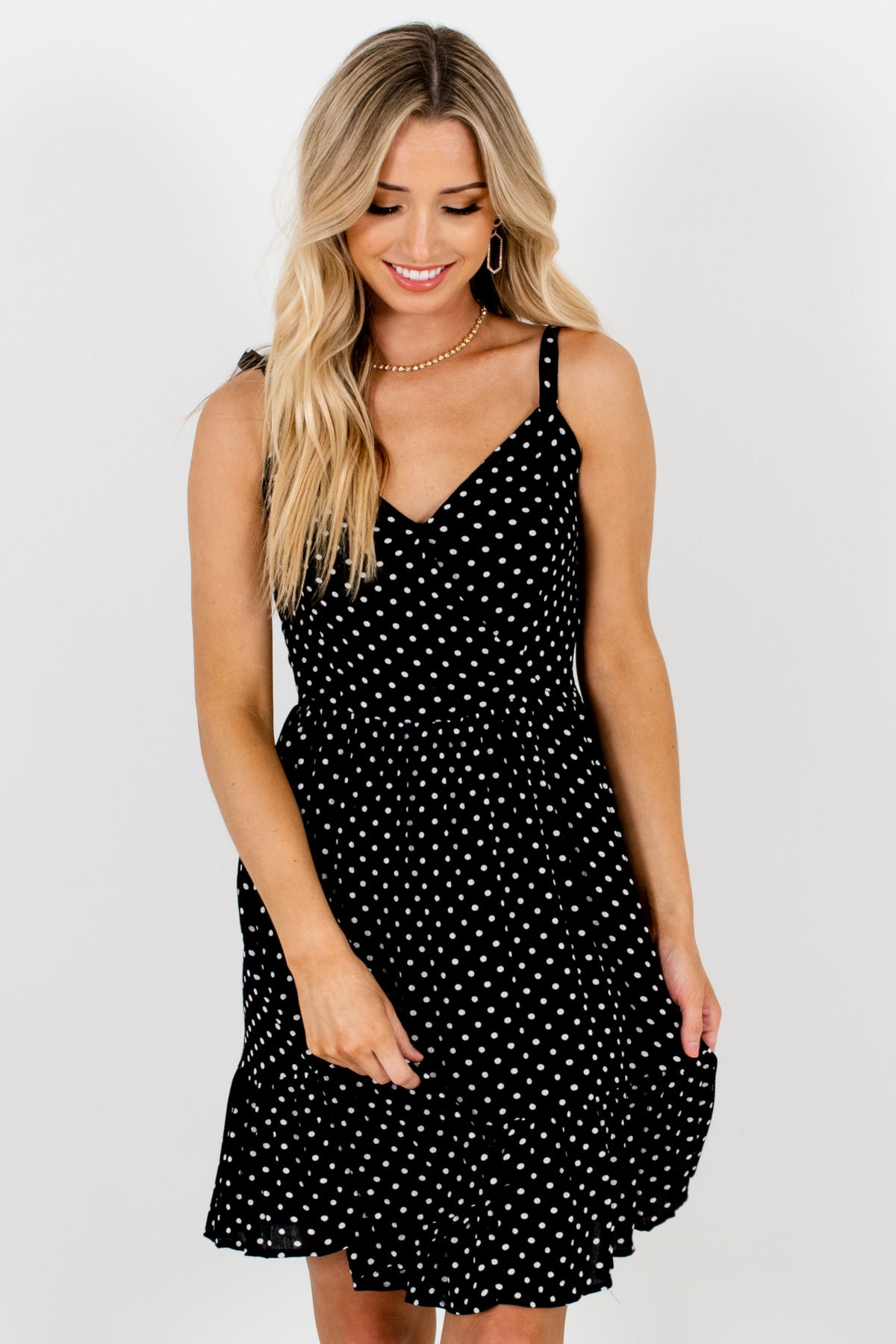 black polka dot mini dress