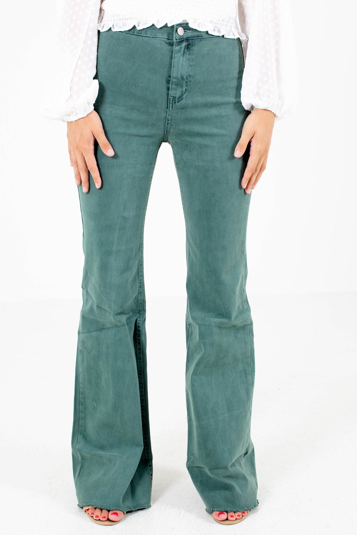 green flare jeans