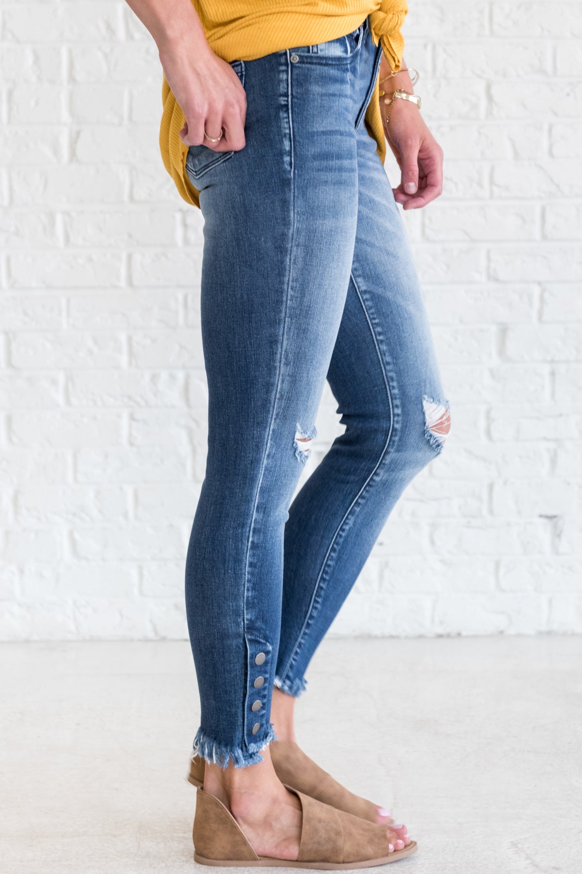 jeans with buttons on side