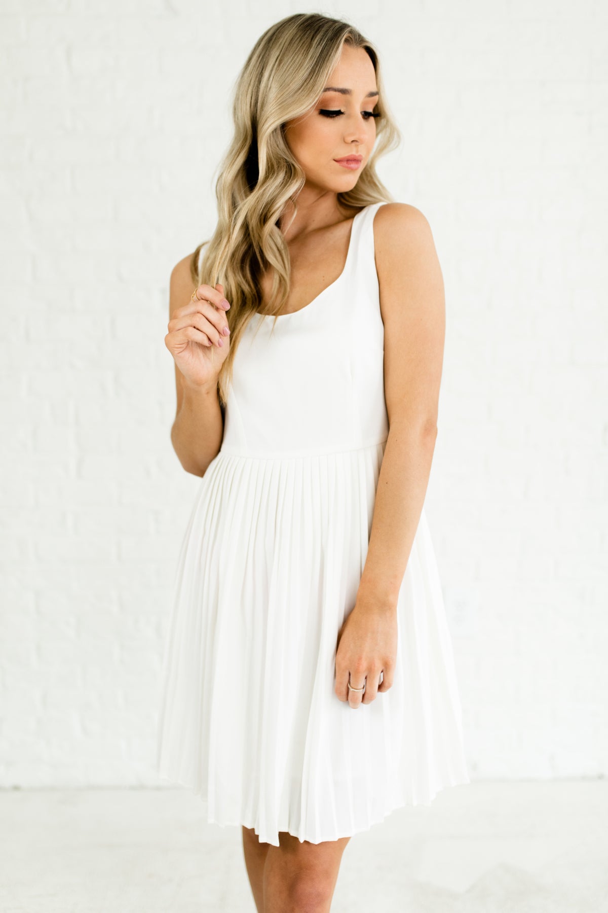 white pleated mini dress
