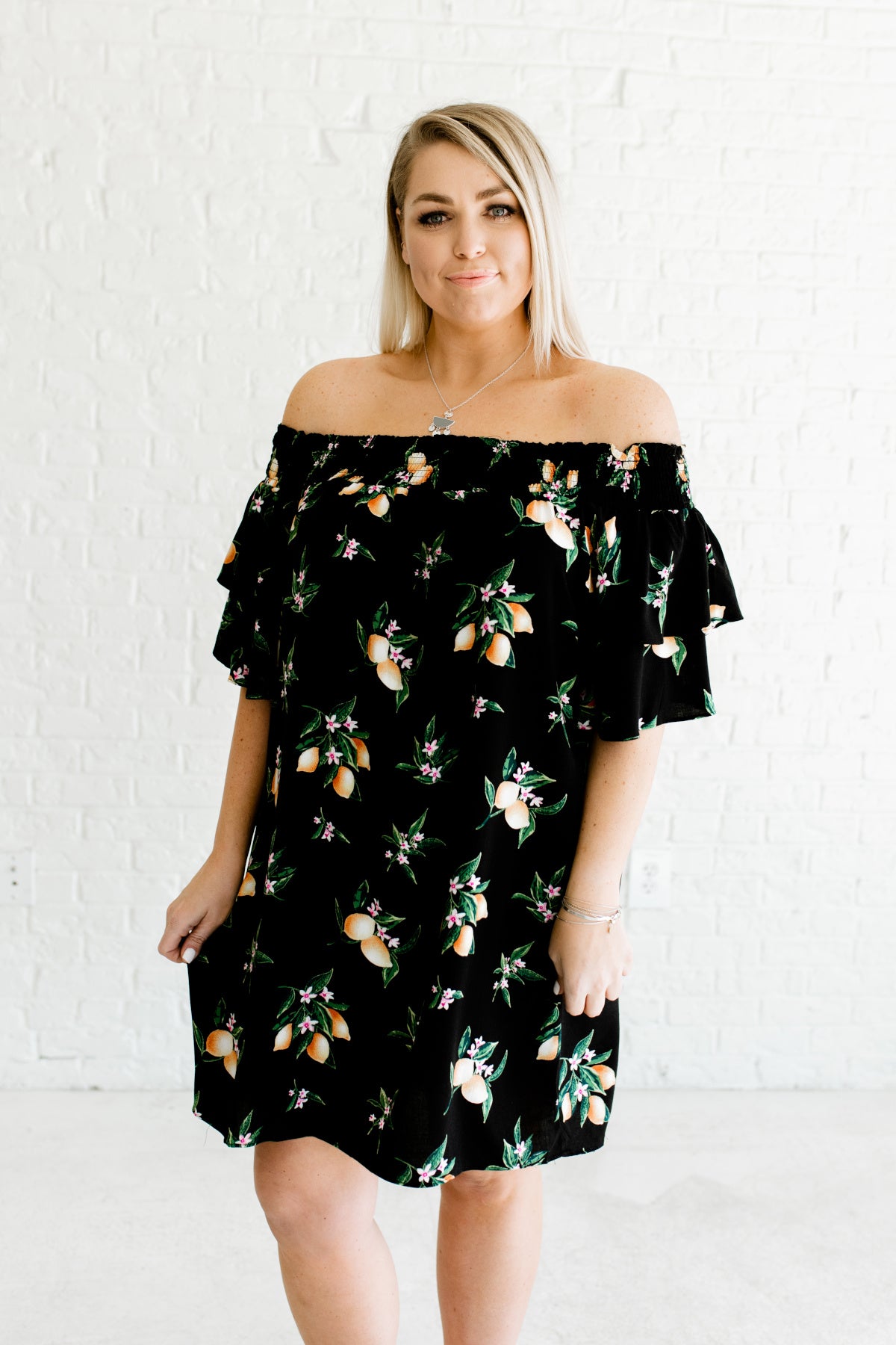 black off the shoulder dress with flowers