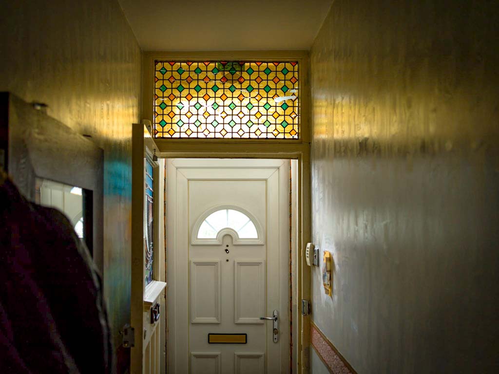 Photograph of Sarifa Patel's front door from inside her house
