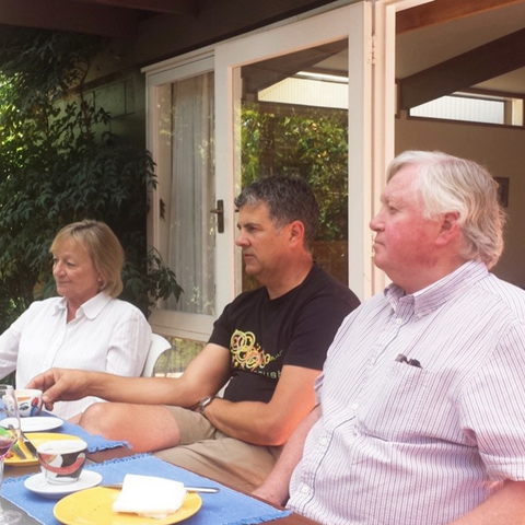 Milan Brajkovich and Hugh Phillips sitting at the table