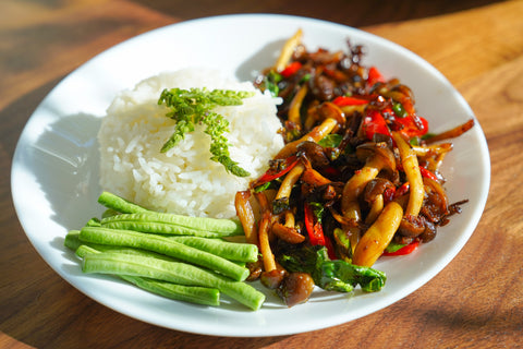 Thai Spicy Stir Fried Mushrooms with basil, garlic and chilies. The Thai name is Pad Kra Pao Hed 