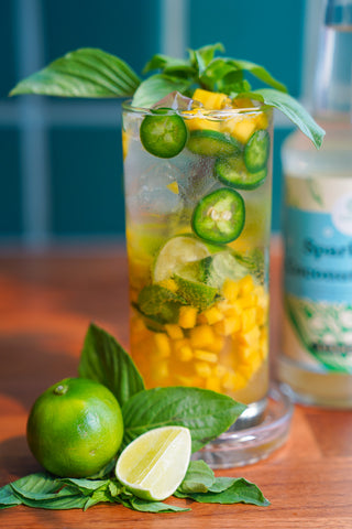 Mango basil and jalapeño summer drink made with Copra's sparkling coconut nectar kombucha alternative