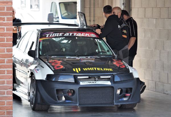 Russ Paton Whiteline Mitsubishi Evo XI Fastr in pit garage at Oulton Park time attack