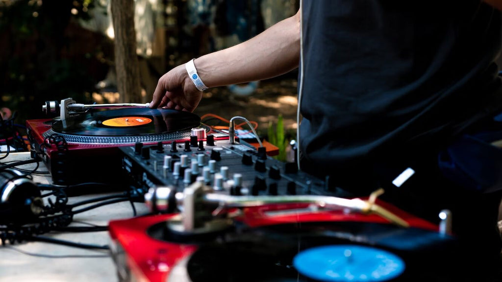 A DJ using a specialized turntable