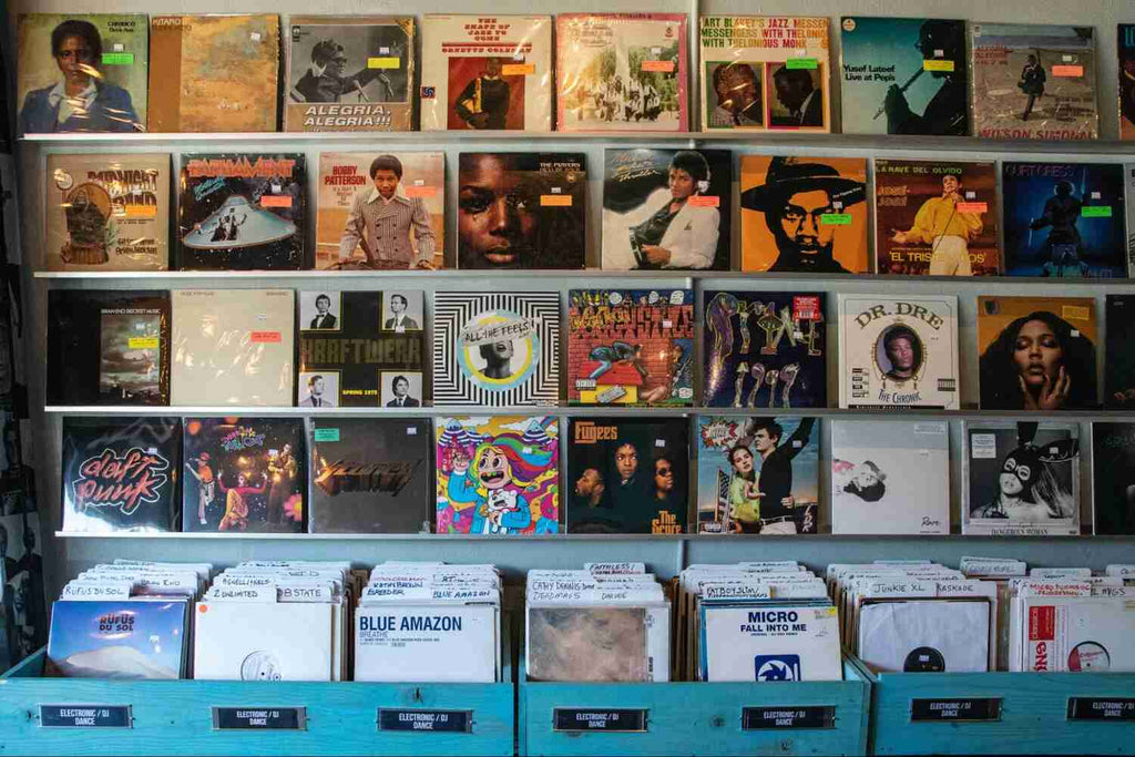 a wall full of vinyl records