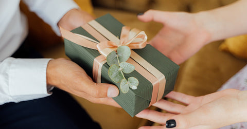 A person giving a gift.
