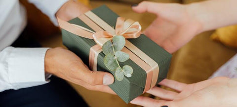 a person giving the gift