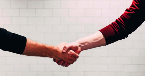 Picture of people shaking hands.