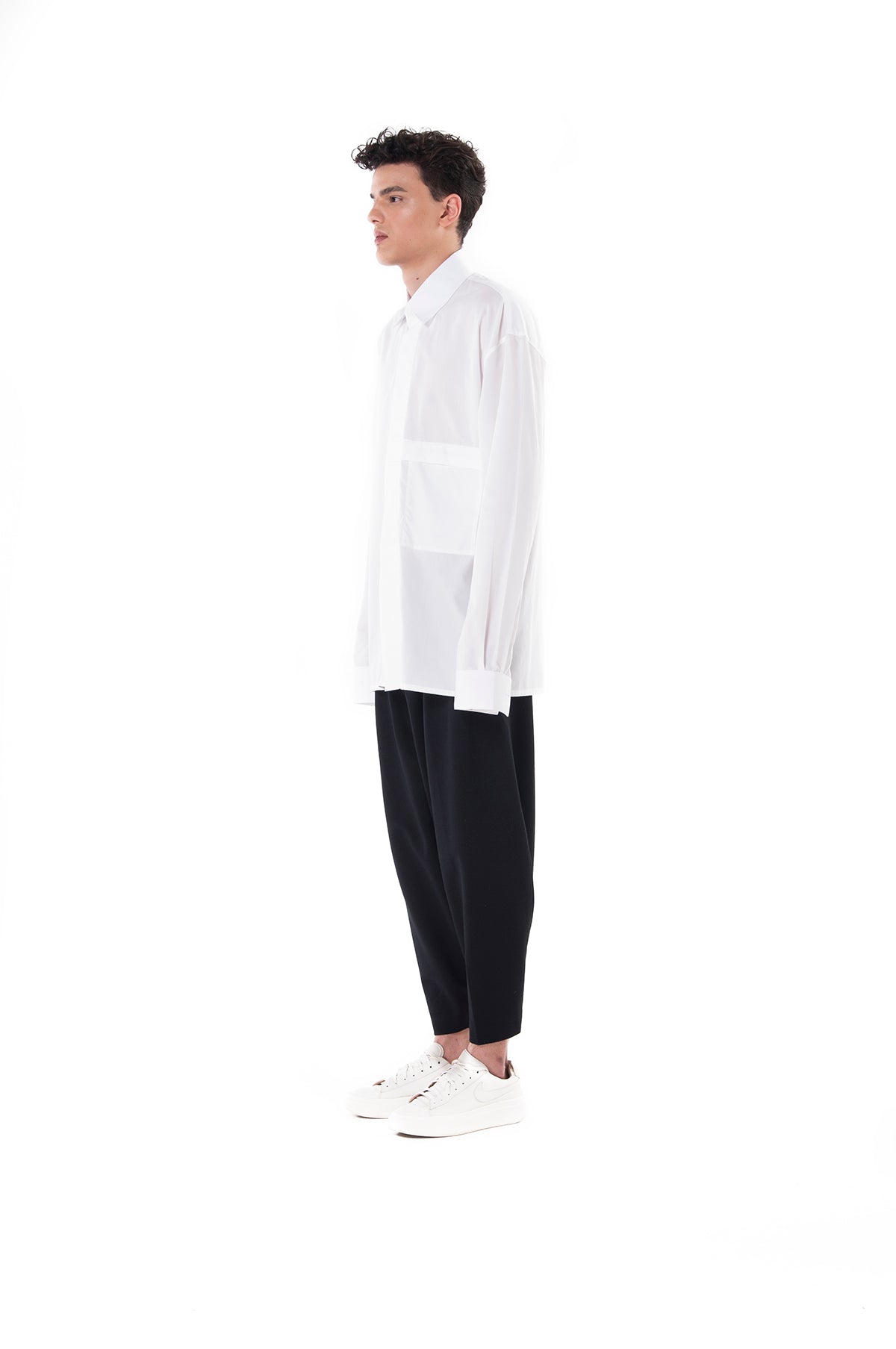 white long sleeve black pants