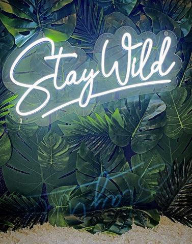 Stay Wild Script LED Neon Flex Sign Cool White on Jungle Leaves Theme Background