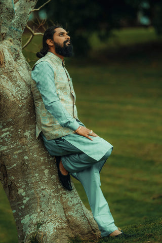 Indian man wearing traditional kurta and punjabi jutti