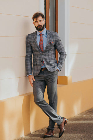 men posing with a glen plaid jacket suit