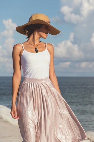 Woman wearing a cami top with a midi skirt