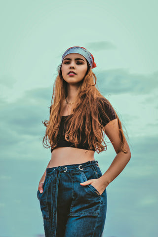 Girl posing with a bandana over her head